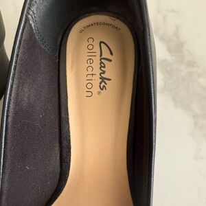 Two pair of clark’s heels!